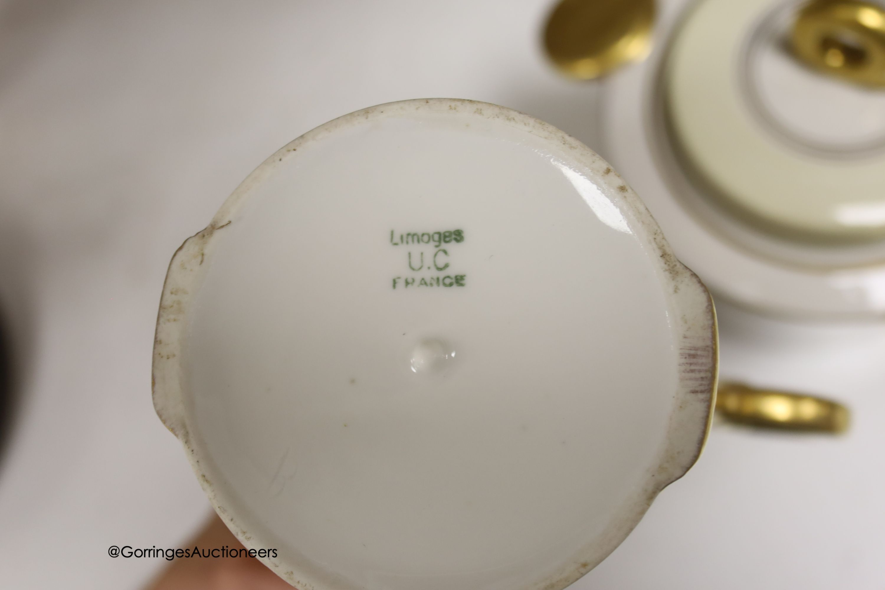 A Carter, Stabler & Adams Poole square serving dish, with cover, width 13cm, a pair of white glazed earthenware nude bookends, a Limoges teaset and three other items